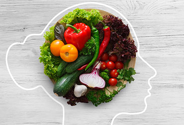 Das biologische Altern beeinflussen Ein Teller mit frischem Gemüse