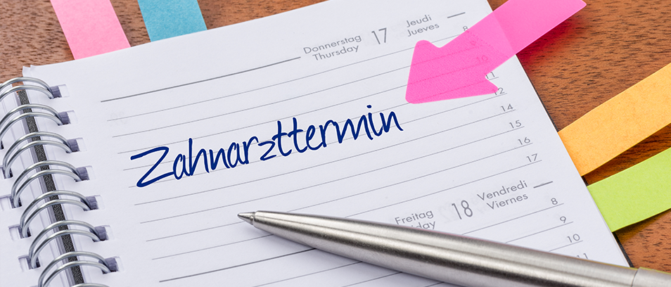 geöffneter Kalender mit eingetragenem Termin