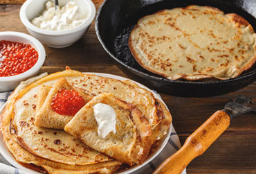 Masleniza, die russische Faschingswoche Bliny, russische Pfannkuchen